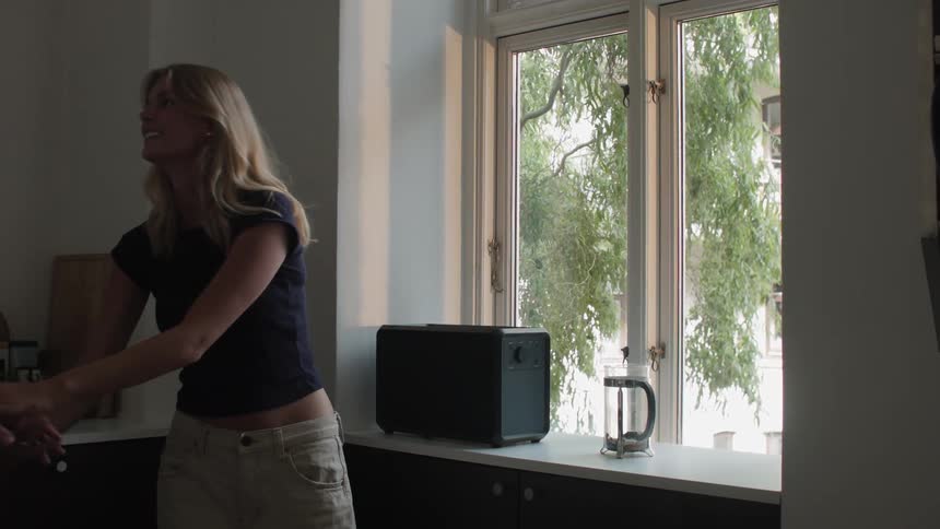 A clip of a male and a female in the house