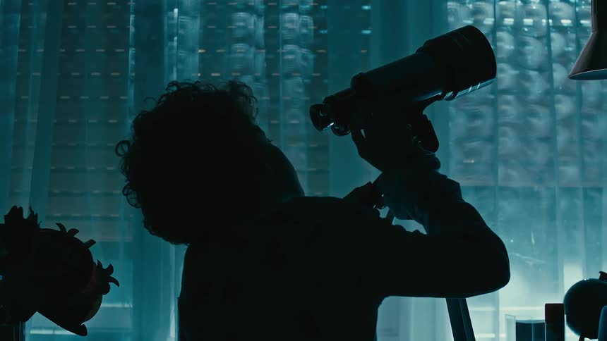 A clip of a boy using a telescope