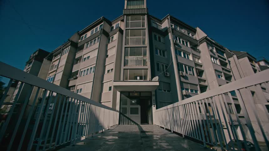 Exterior view of apartment buldings against the blue sky