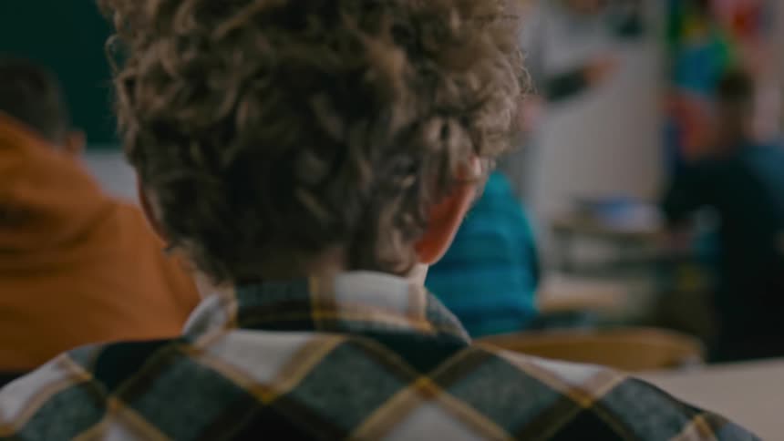 A boy in a classroom