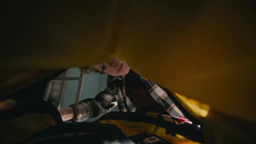 A clip of a boy packing up some valuables