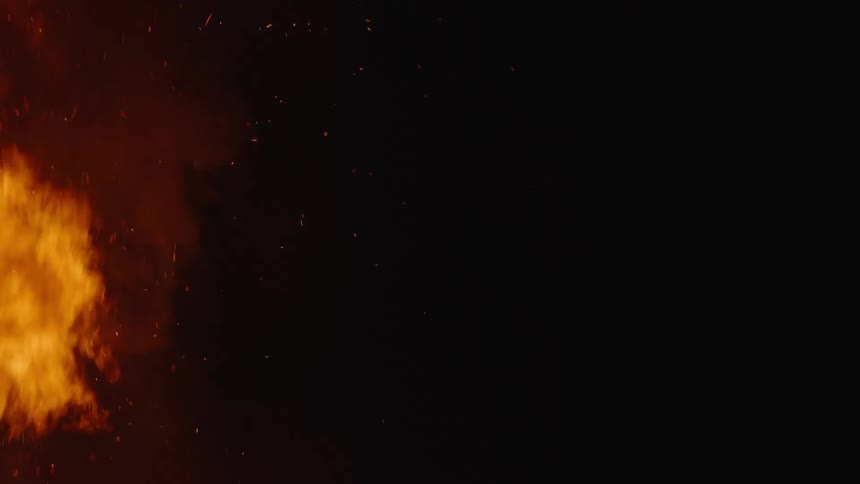 Flame rising up against the black background