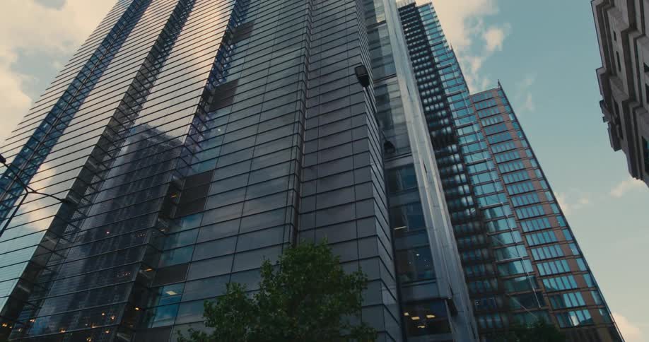 Upward view of modern mirrored commercial skyscrapers
