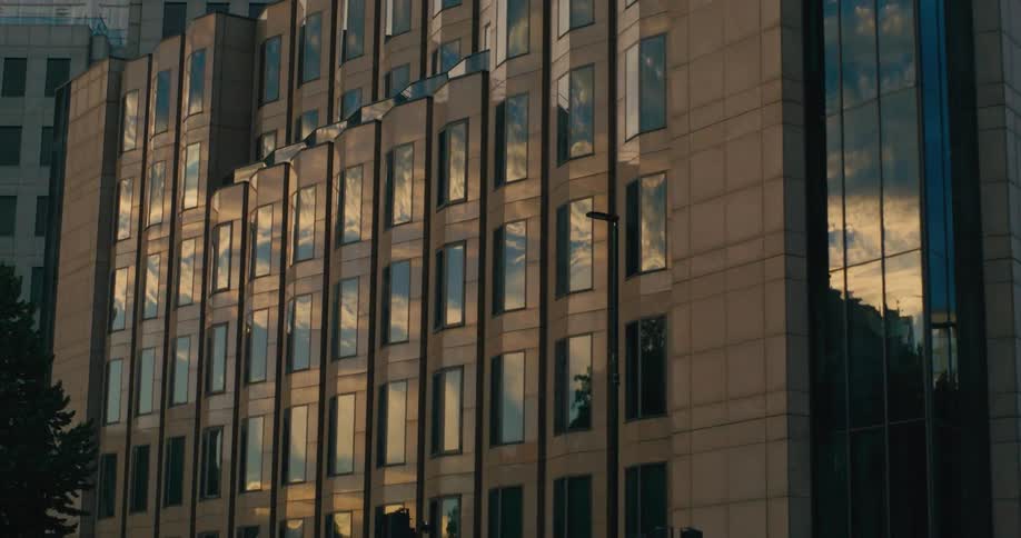 A clip of a high building with glass window