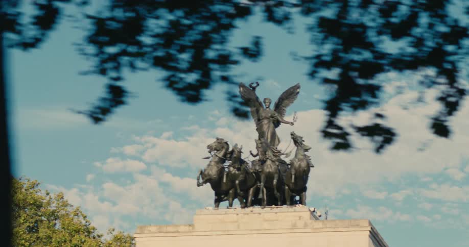 A large statue is on the platform