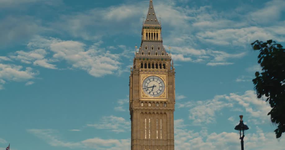 Clock tower with classic city architecture during daytime