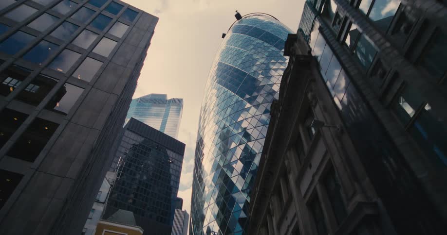 Driving through the City of London under the Gherkin