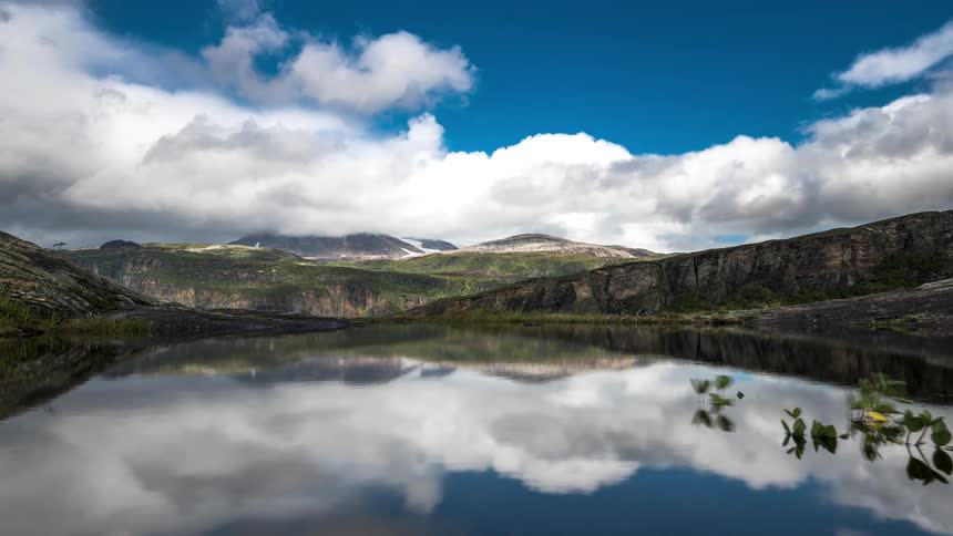 The lake reflects the sky