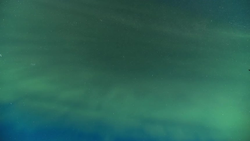 The northern lights playing across the sky