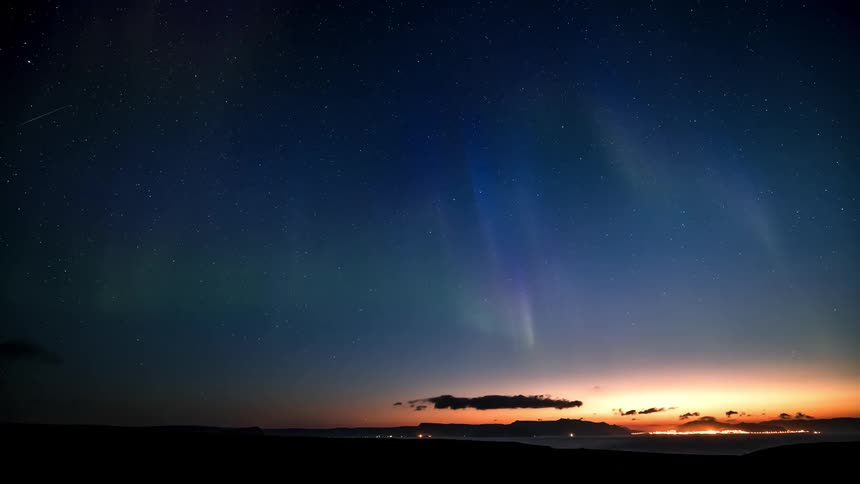 The sky is bright with aurora