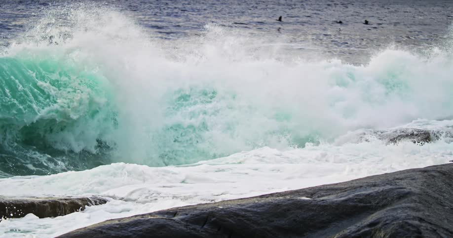 Landscape of ocean waves breaking against the rocky shore