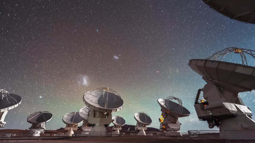 Panorama of scientific antenna pointed at the sky with stars