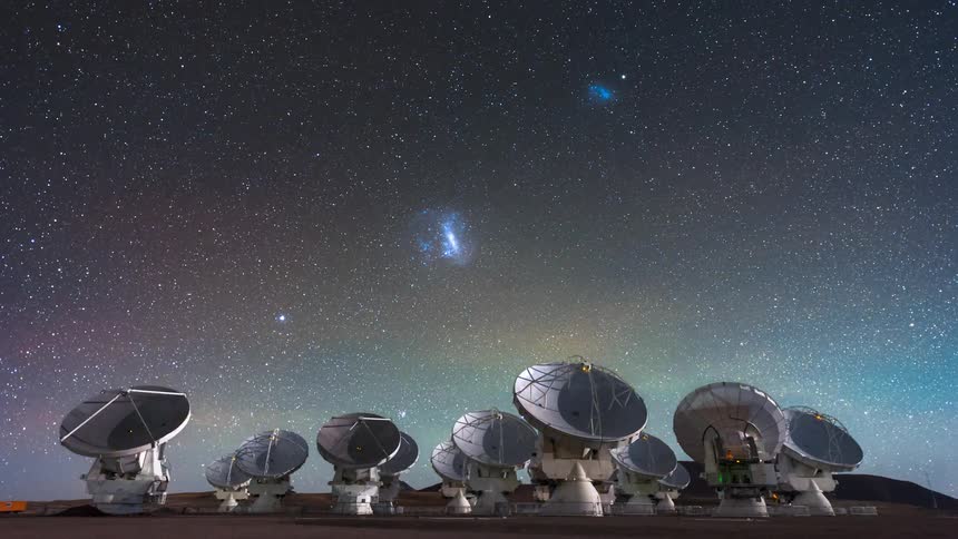 Panorama of several telescopic antennas pointed at the sky with a day in timelapse dusk and the starry sky