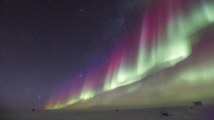 The Aurora Australis shine over the landscape