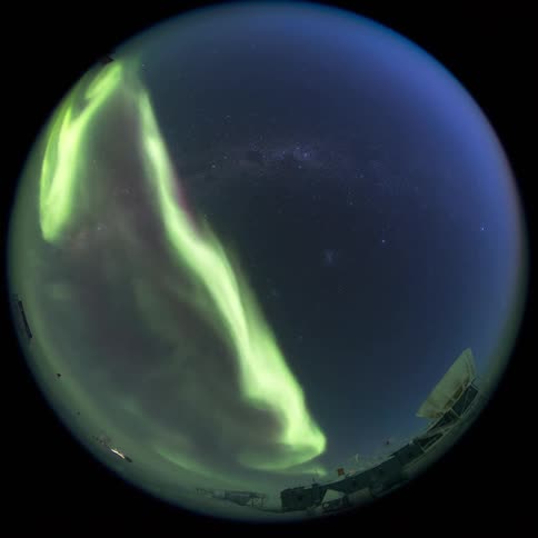 The Aurora Australis in the night sky seen through a fisheye lens