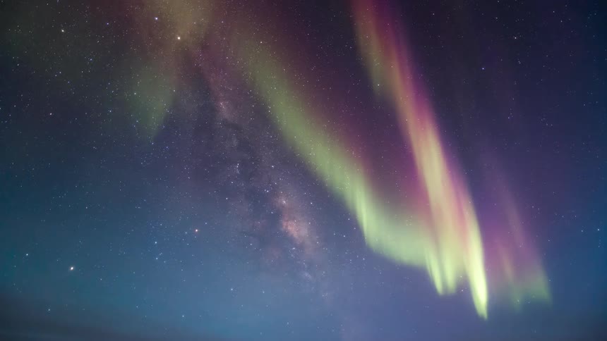 The aurora shines in the night sky