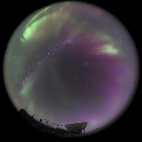 fisheye camera pointed at the sky with the Aurora Australis
