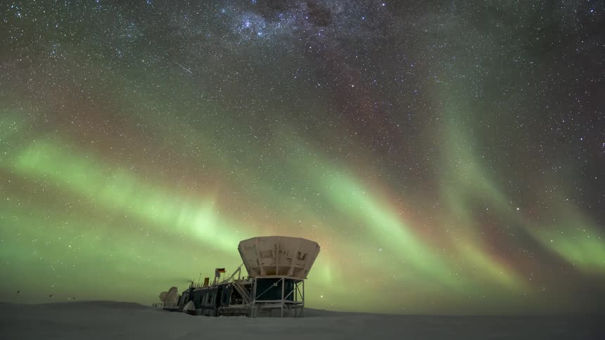 The green aurora passes over the telescope