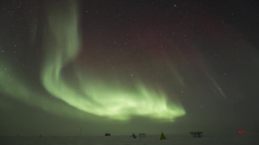 Antarctic landscape at night with Aurora Australis