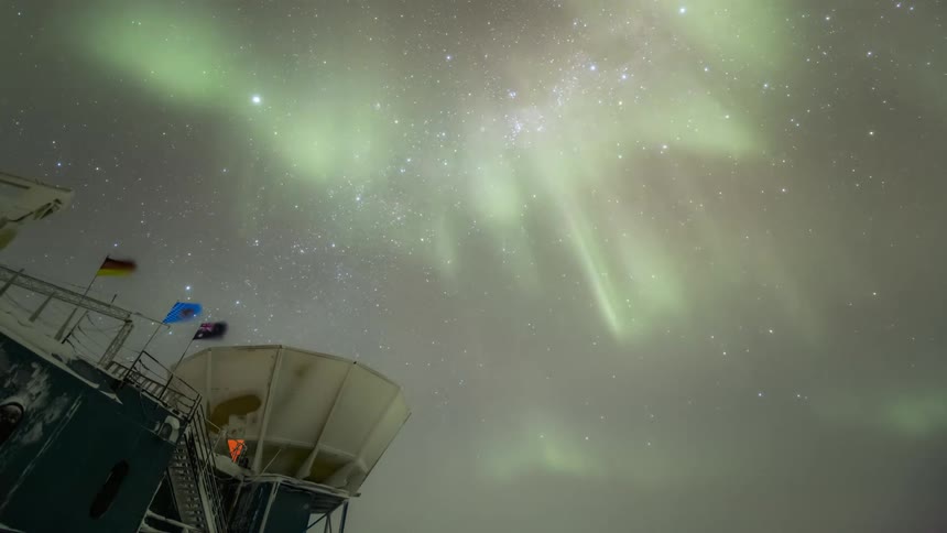 The sky is full of green aurora