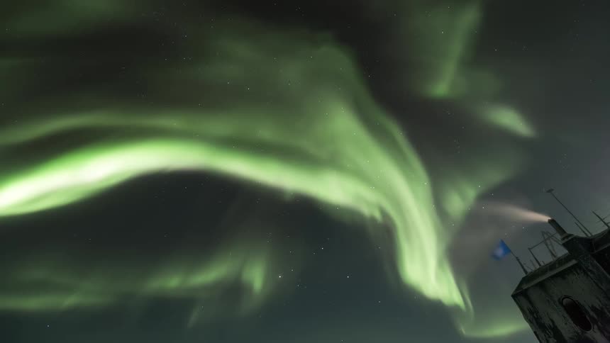 Aurora Australis shining over a research station