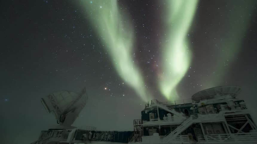 The Aurora Australis shine over the telescope