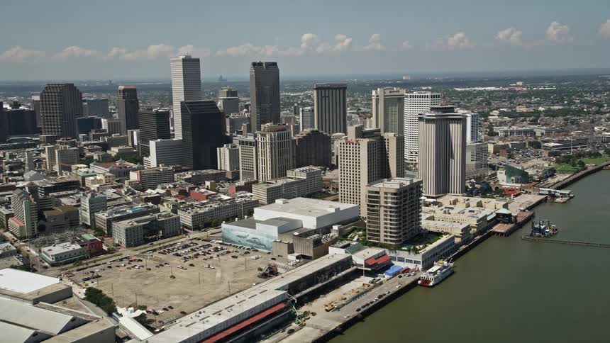 Skyline of a port with ships docked in the urban city during the day
