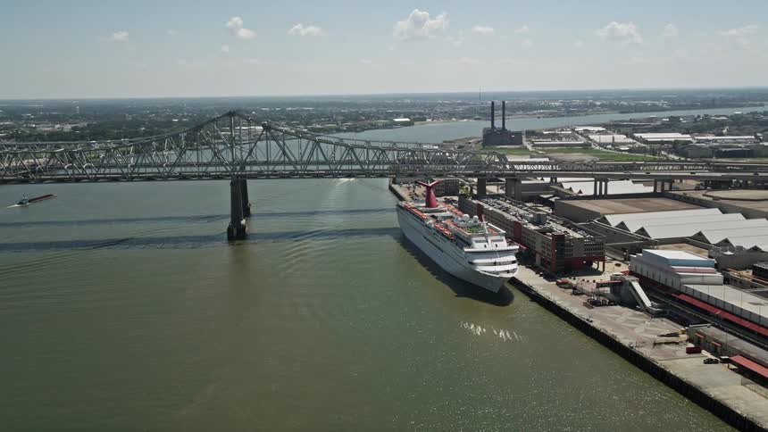 A large cruise ship on a river port