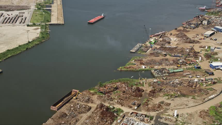 A riverfront cluttered with rubble