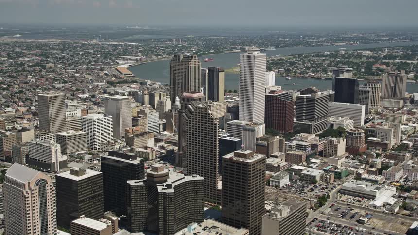 A stadium and skyscrapers in a city downtown