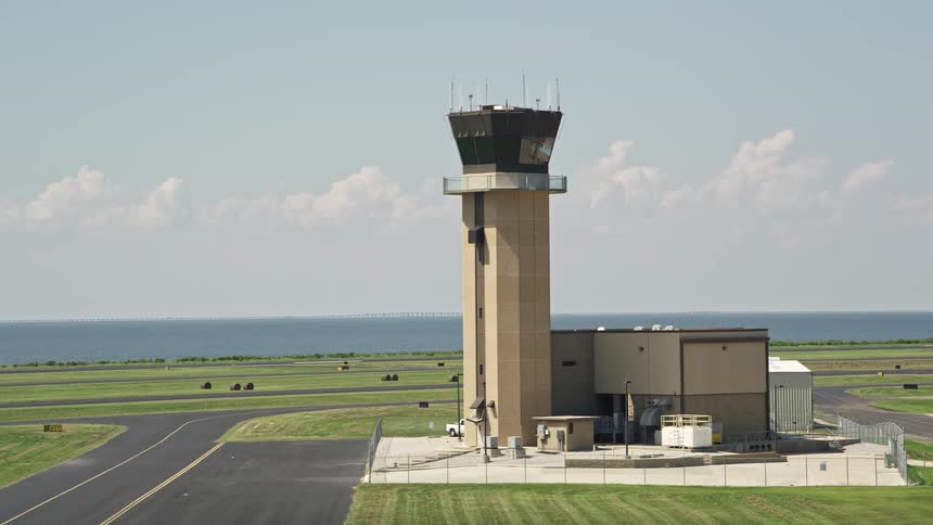 Aerial of a tower at an airport in a rural town