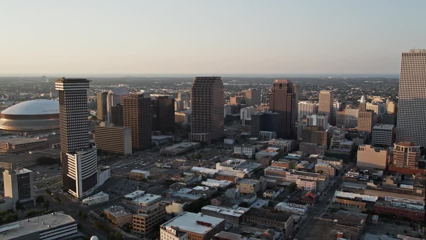 Aerial panorama of a metropolis with a skyscraper a sports stage globe in a morning