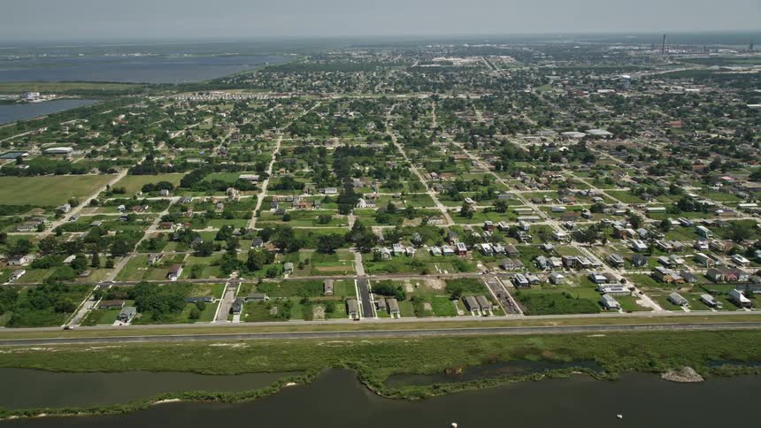 A large suburb next to a river
