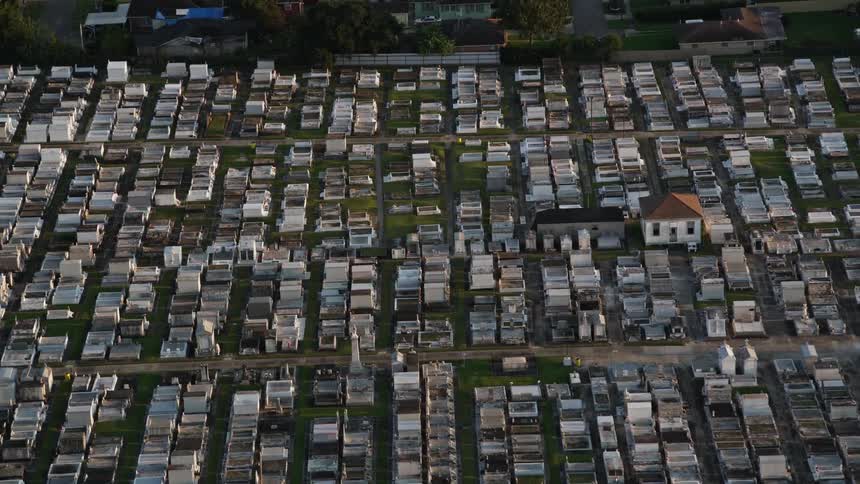 A large graveyard in a suburban area