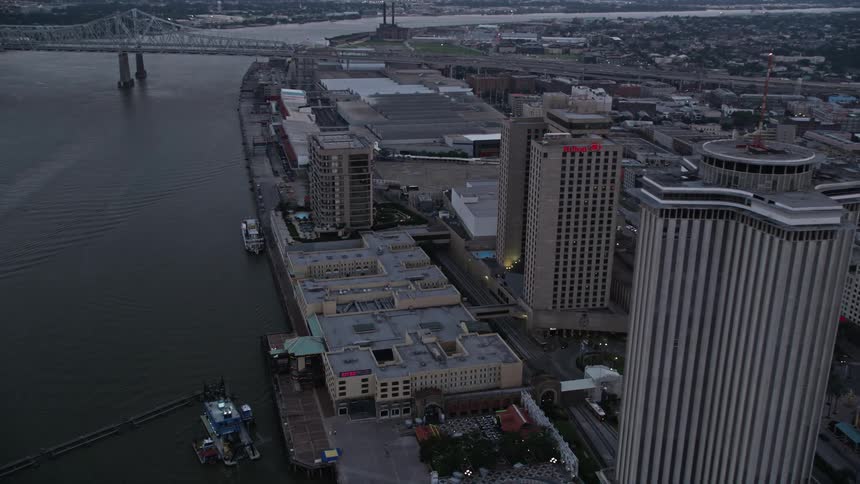 Aerial panorama of a metropolis with skyscrapers on the edge of a sea canal
