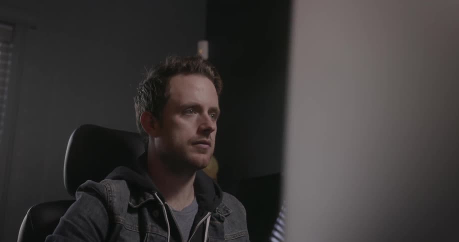 Man sitting in a chair and looking forward