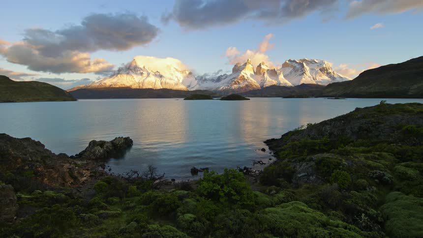 A night and day clip of a mountain and river