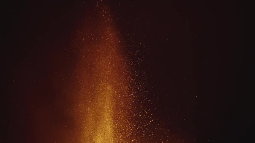 Lava shoots up in the night sky
