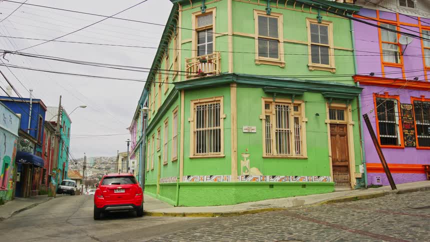 Colorful buildings in a residential neighborhood during a cloudy day