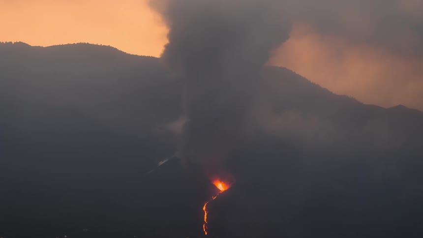 A smoker mountain with fire eruption