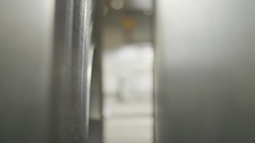 Close up of rolls of aluminum sheet in a factory