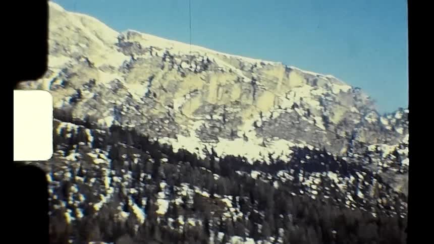 A mountain valley covered in snow during winter