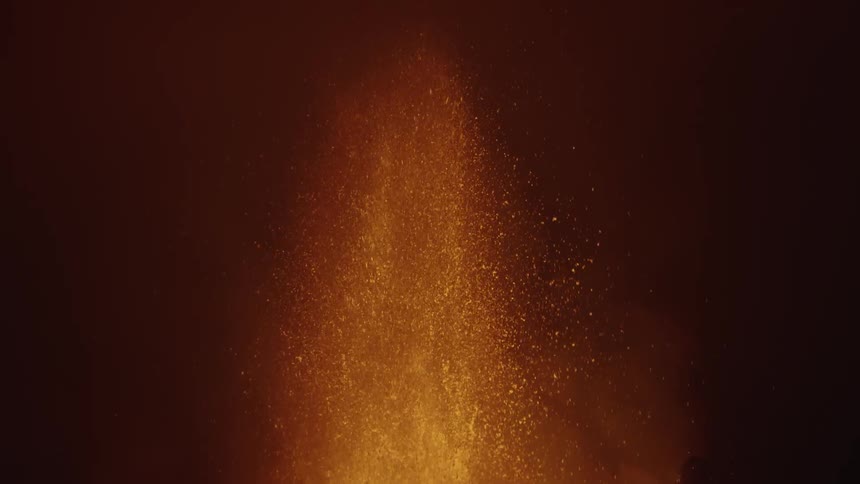 An erupting volcano releasing lots of lava and fire upwards