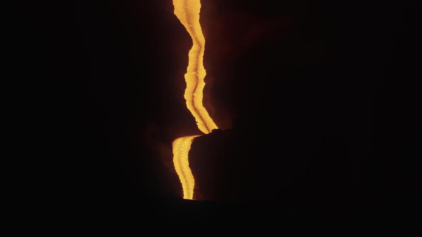The lava runs down the volcano