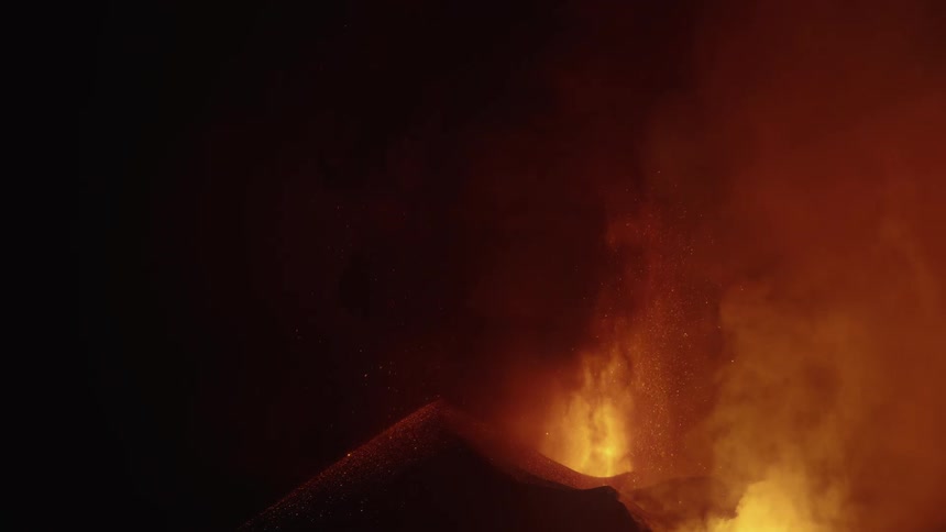 Volcano erupting at night and slow motion