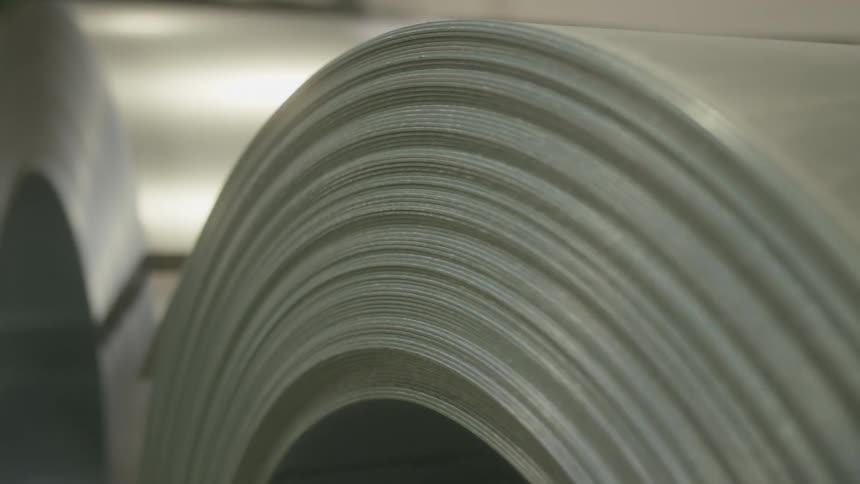 Rolls of aluminum stacked side by side