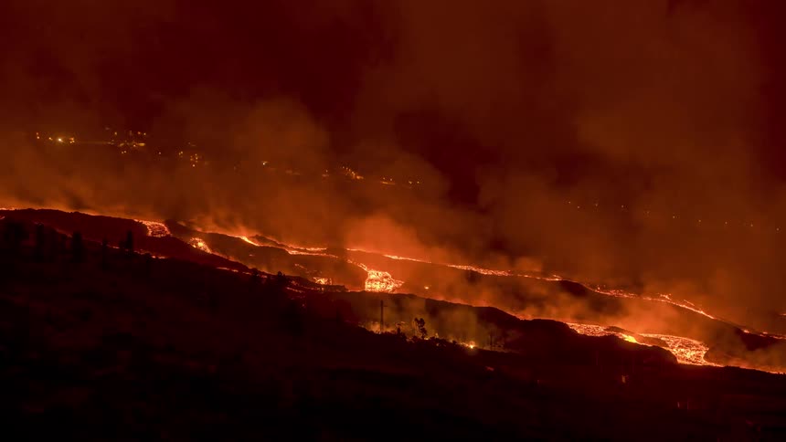 A volcanic eruption sets forests on fire