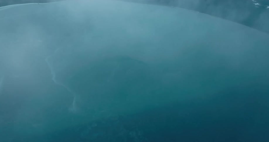 Aerial view of the interior of a large body of water under the clouds