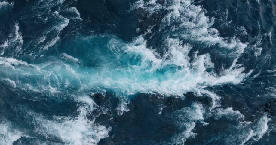A gentle flow of a turquoise water river during the day