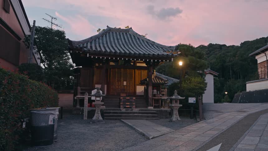 Traditional Japanese house and roofing at sunset